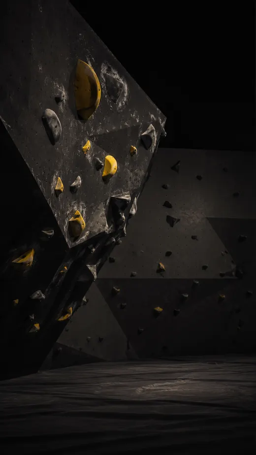 Muro de escalada indoor com agarras amarelas